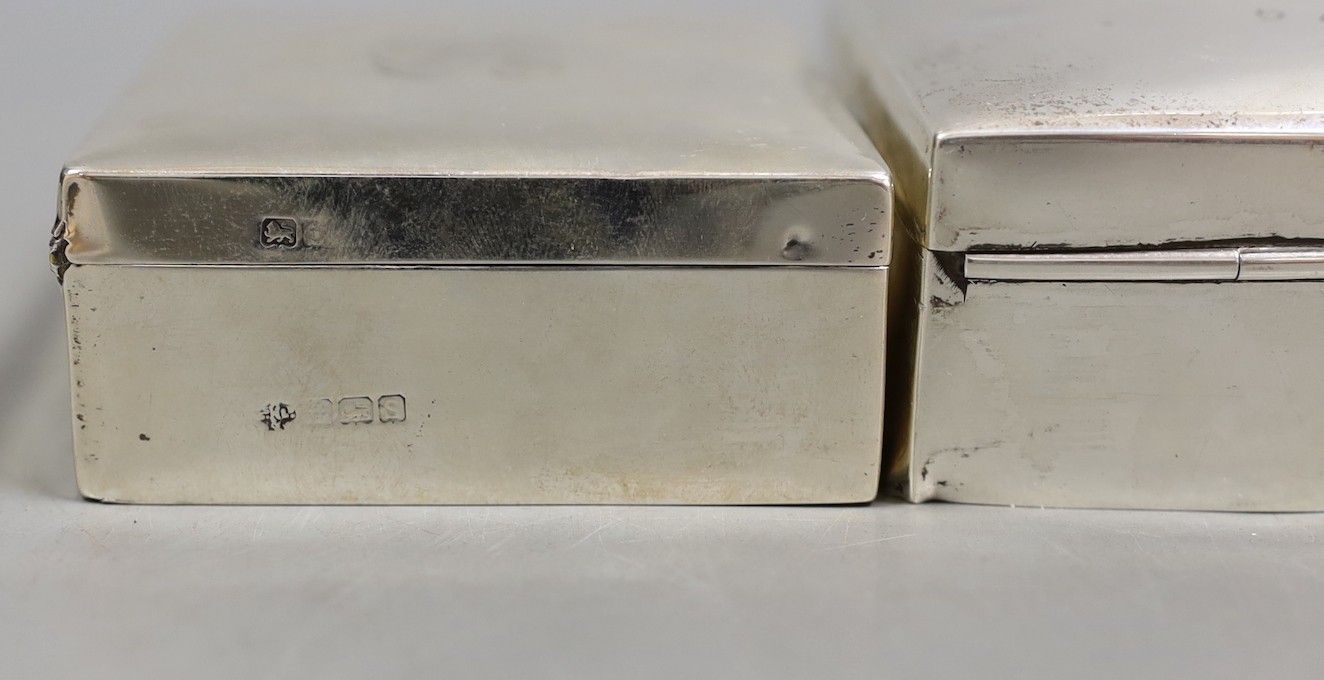 A George V silver mounted cigarette box, William Hutton & Sons, Birmingham, 1917, 89mm and a later larger Egyptian white metal cigarette box.